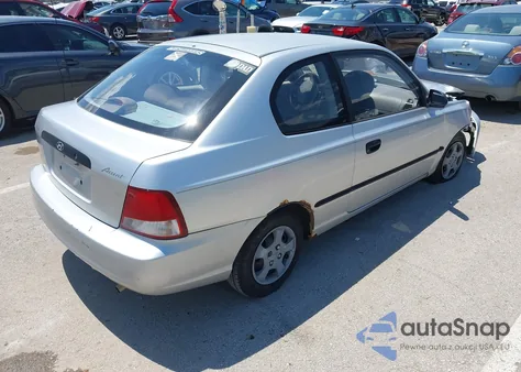 2000 Hyundai Accent L из США, поврежденный, VIN KMHCF35G6YU019915
